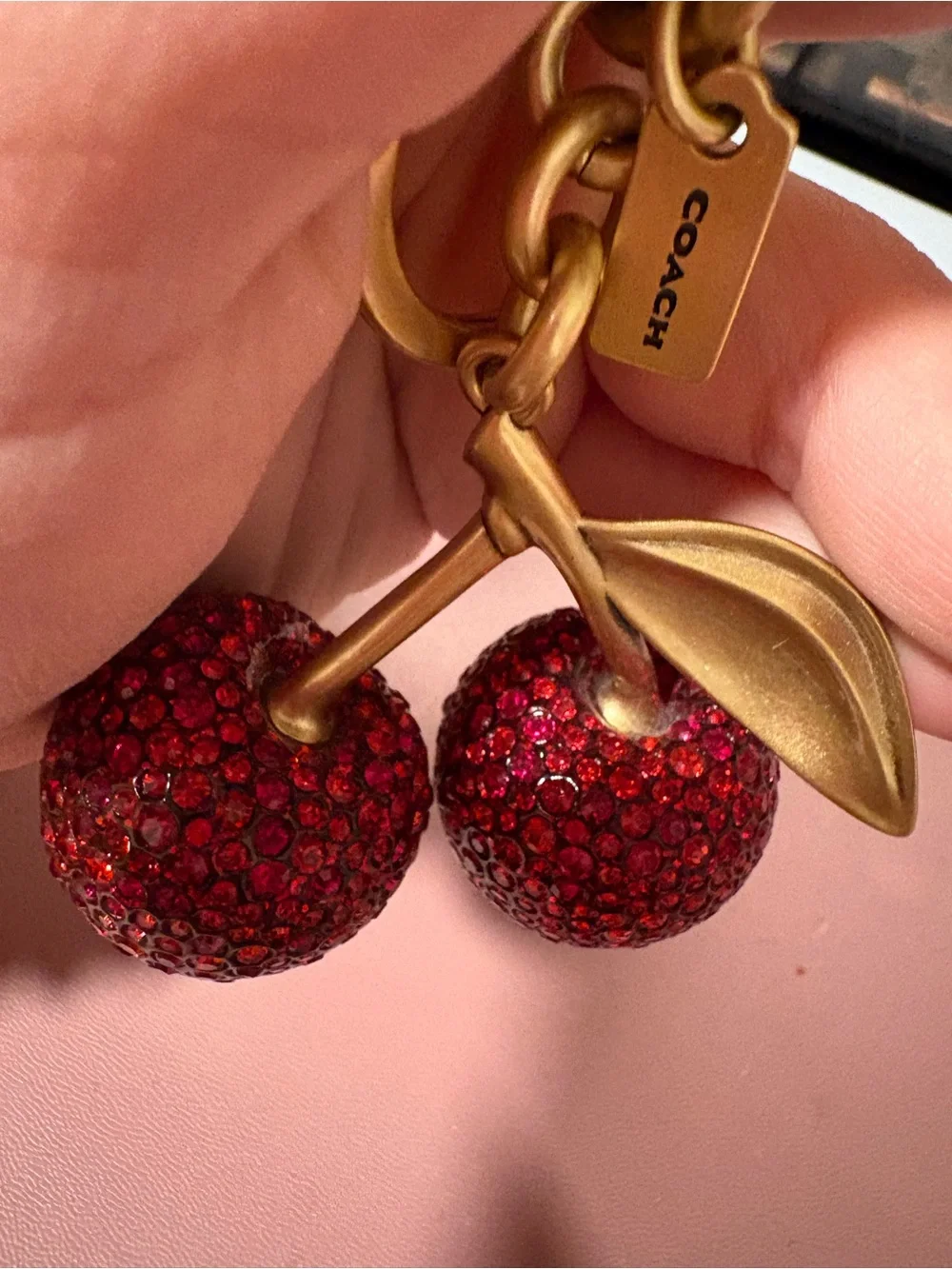 Coach Gold-Tone Cherry Charm Keychain with Red Crystals
